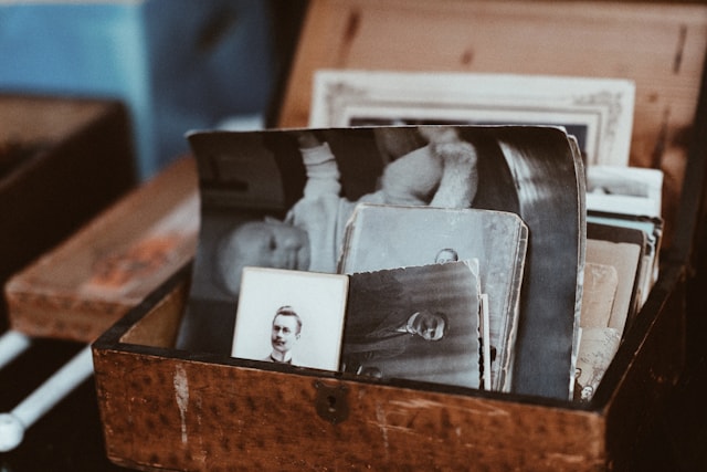 Vintage family photographs in a wooden box